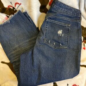 Distressed raw hem jeans